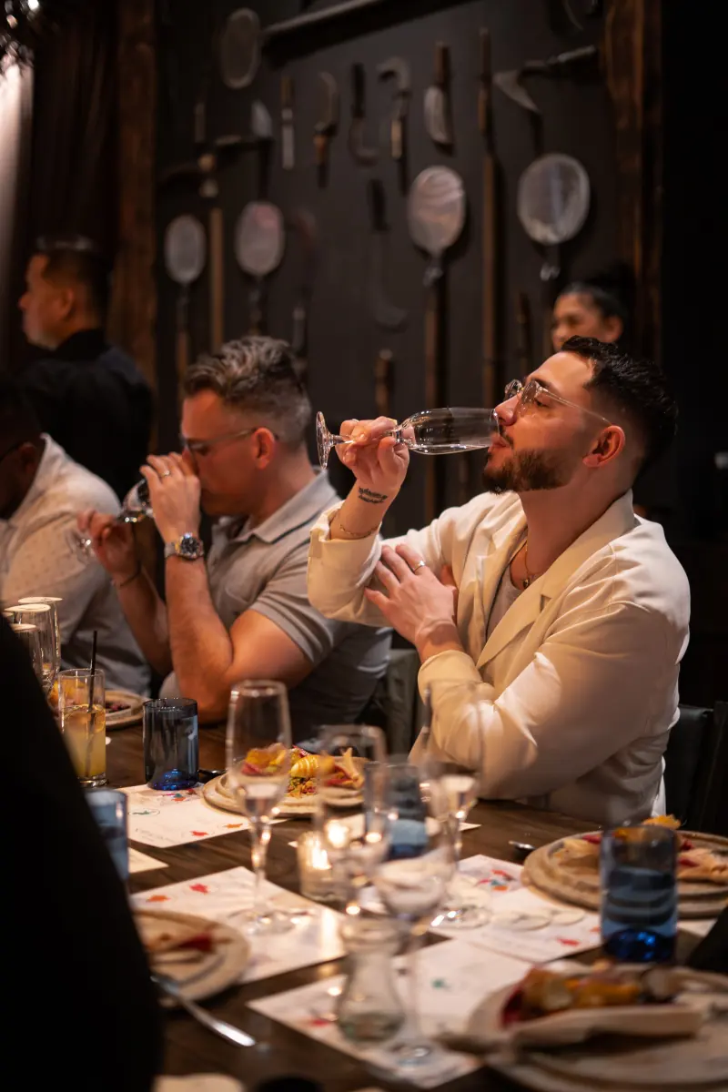 Guests at a tasting dinner